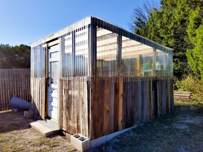 View of greenhouse featuring fence | Image 30