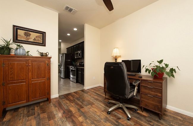 Home office with baseboards, a ceiling fan, dark wood-style flooring, and recessed lighting | Image 8
