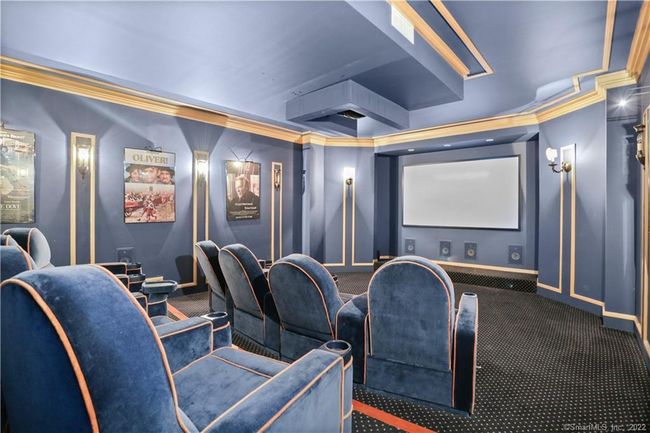 THEATRE // Impressive home theatre with posh seating for 8. Large screen installed by Westfair offering TV, DVD and Video capability. | Image 29