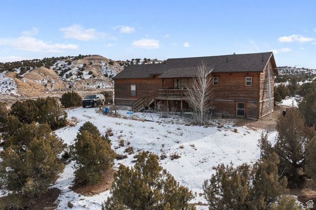 View of snow covered property | Image 4