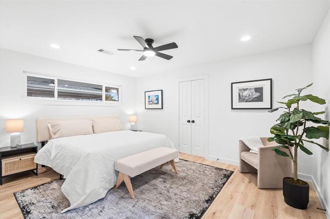 Primary Bedroom with backyard access, plenty of storage and natural light everywhere | Image 12
