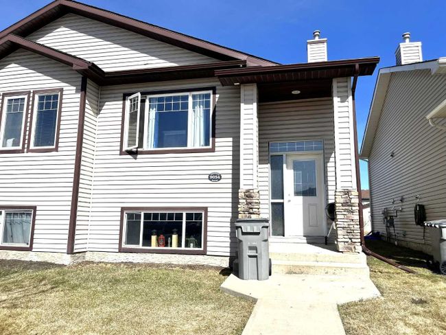 9054 92 Avenue, Home with 4 bedrooms, 2 bathrooms and 2 parking in Grande Prairie AB | Image 1
