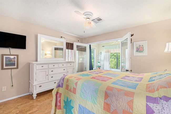 Bedroom 2 with french doors to the balcony | Image 18