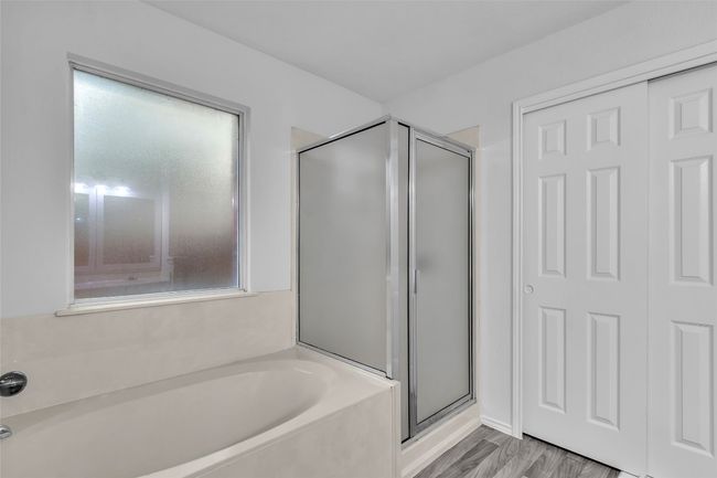 Bathroom with a garden tub and a stall shower | Image 21