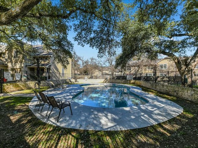 View of pool with fence and a fenced in pool | Image 29
