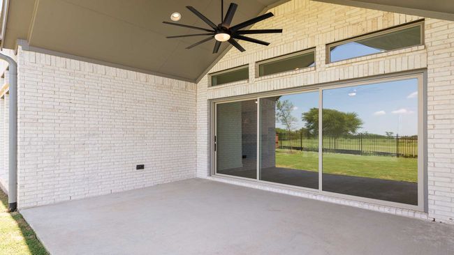 View of patio / terrace featuring fence and ceiling fan | Image 19