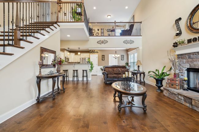 A stunning gas fireplace serves as the centerpiece, creating a warm and inviting atmosphere.1107 Sycamore Leaf Way Murfreesboro, TN 37129 | Image 5