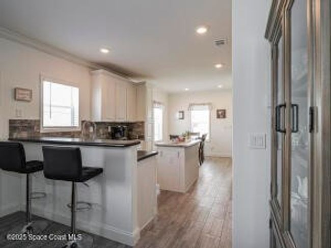 623 Hyacinth Cir, House other with 3 bedrooms, 2 bathrooms and null parking in Barefoot Bay FL | Image 10