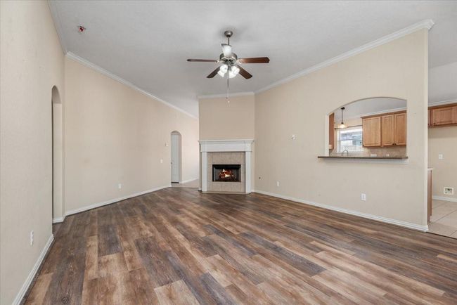 Living room area with a great fireplace. | Image 15