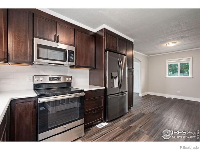 New kitchen is sure to please the cooks in your household. | Image 9