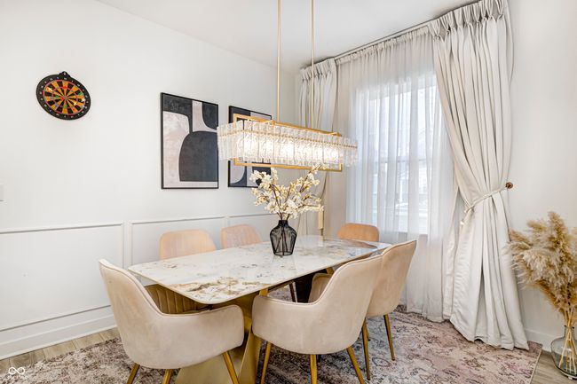 dining room with wood finished floors | Image 13