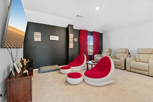 Living room with carpet and visible vents | Image 23