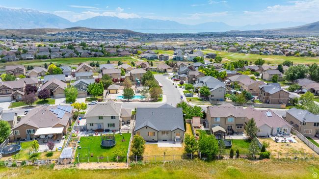 Aerial perspective of suburban area with a mountain backdrop | Image 42