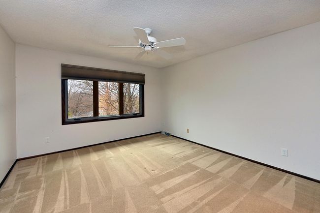 Freshly Painted Upper-Level Bedroom 1 Features 3/4 Bath and Large Closet! | Image 12
