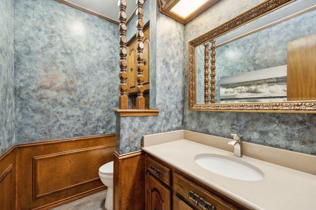 Half Bathroom with Wainscoting and a 70s Vibe | Image 16