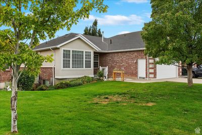 View of front of house with a front yard and a garage | Image 3