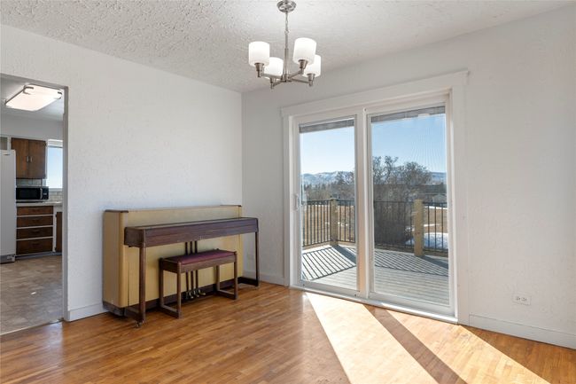 Direct access to the outdoor deck from the dining area. | Image 35