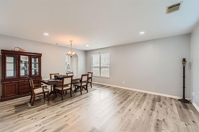 Welcoming formal dining room just off the front entrance. | Image 9