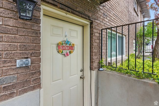 Entrance to property featuring brick siding | Image 34