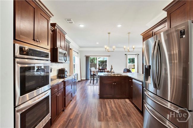 View of kitchen from the Dining Room looking towards to Breakfast Bar and The Breakfast Room | Image 12