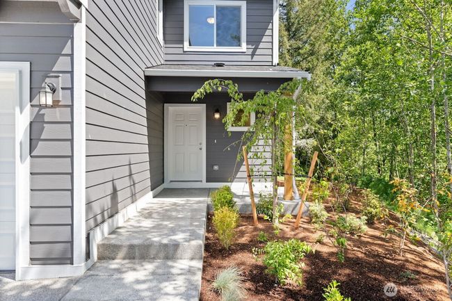 Photographs are for illustrative purposes only. Features, finishes, interior/exterior colors, landscaping and floorplan shown may vary from actual homes built. | Image 6