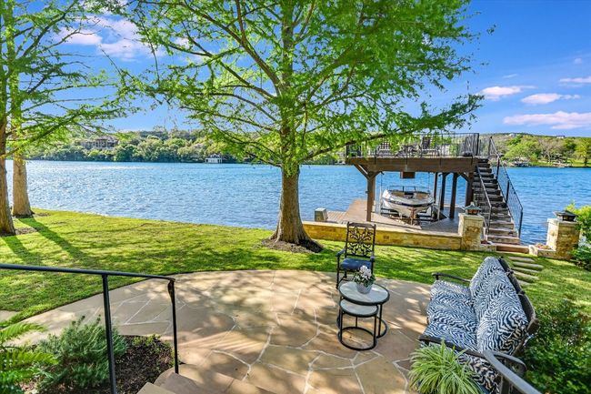 View of patio with a water view and a dock | Image 21