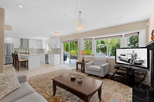 Living room featuring a chandelier, recessed lighting, and light wood finished floors | Image 12