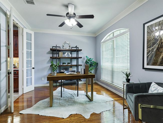 Office space featuring french doors, ornamental molding, ceiling fan, and wood finished floors | Image 6