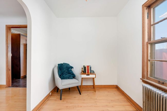 The den is a sweet space located just off the dining room. | Image 11