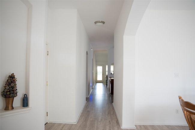 Hall featuring light wood-style flooring | Image 5