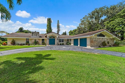437 N Country Club Dr, Atlantis, FL, 33462-1003 | Card Image