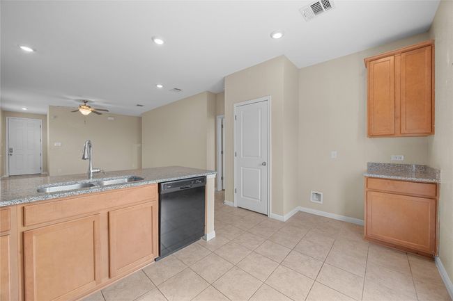 Open to living area; pantry for extra storage | Image 8