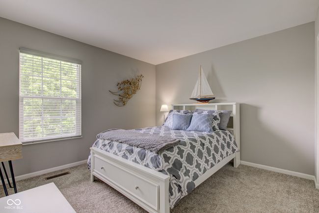 carpeted bedroom with baseboards | Image 15