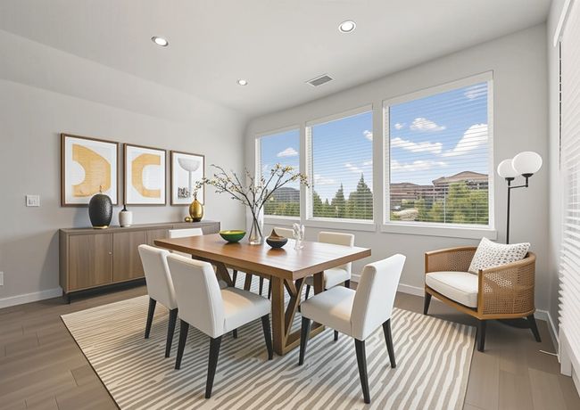 Dining room with recessed lighting and light wood-like tile floors. (Virtual Staging) | Image 14