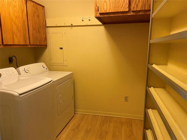 There is plenty of room in the laundry/pantry room. | Image 20
