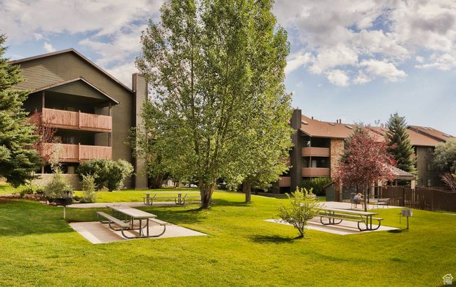 View of property's community with a yard | Image 26