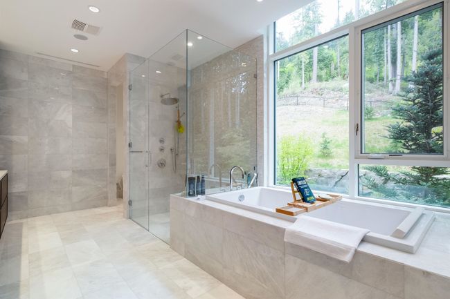 Full bathroom featuring a stall shower, a garden tub, recessed lighting, and vanity | Image 22