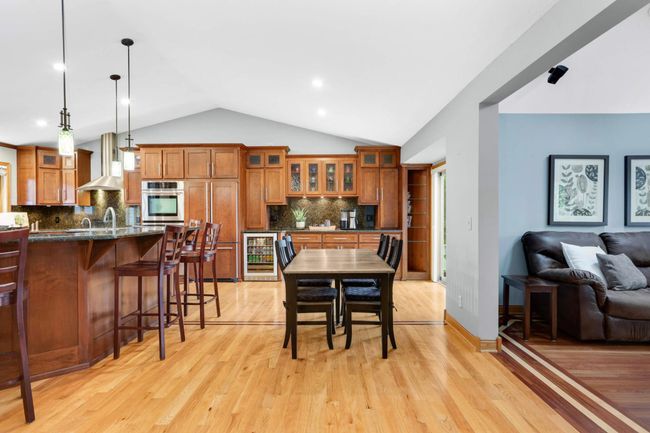Gather around the kitchen island or the dining room table - the choice is yours! | Image 12