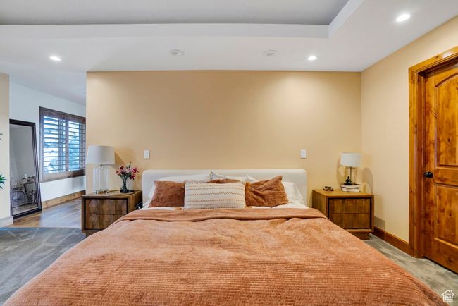 Bedroom with carpet floors, baseboards, and recessed lighting | Image 16