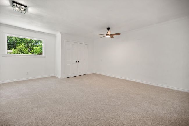 flex room that can be used a secondary living area, playroom, office, or music room | Image 13