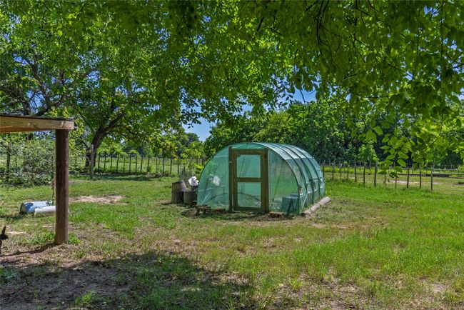 View of yard with an exterior structure and an outdoor structure | Image 39