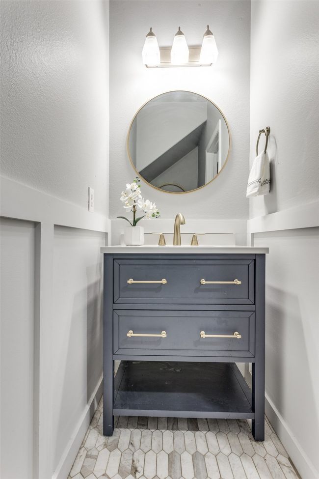 Bathroom featuring vanity and baseboards | Image 22