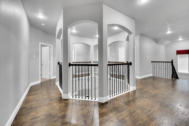 Unique upstairs area with beautiful rotunda area. Hardwood floors. | Image 19