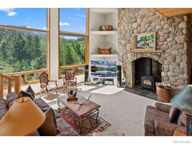 Living room with fireplace | Image 19