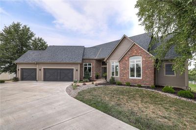 View of front of property with a garage and a front yard | Image 3