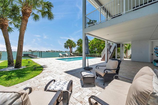 Large pool deck with ample room for seating - either under the shade of the lanai, or full sun. | Image 6