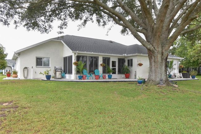Back View of the House with a Lovely sitting area | Image 23