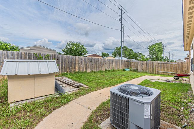View of yard with central AC | Image 34