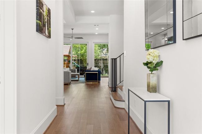 Formal entry, 8" baseboards, Engineered European White Oak 5" plank floors. | Image 8