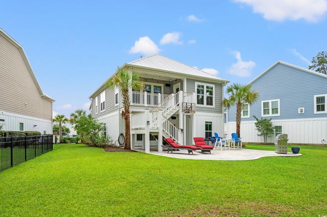 Back of house with stairs and a patio area | Image 25